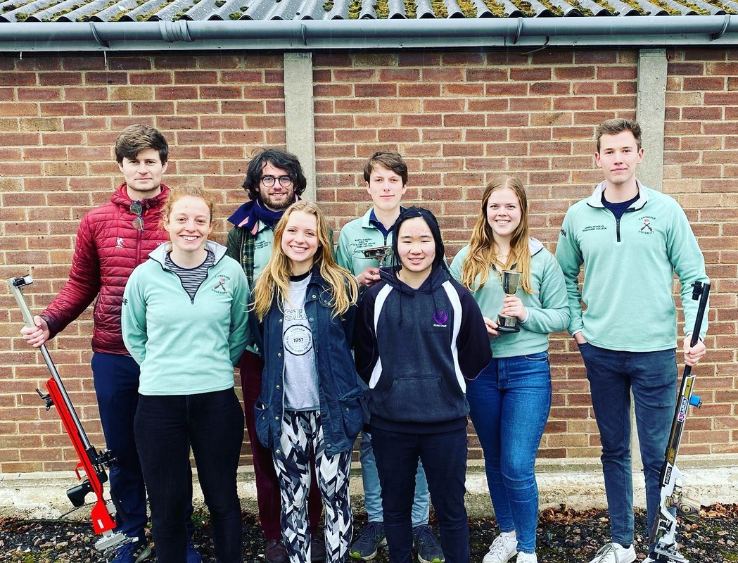Cambridge smallbore shooters standing outside a range